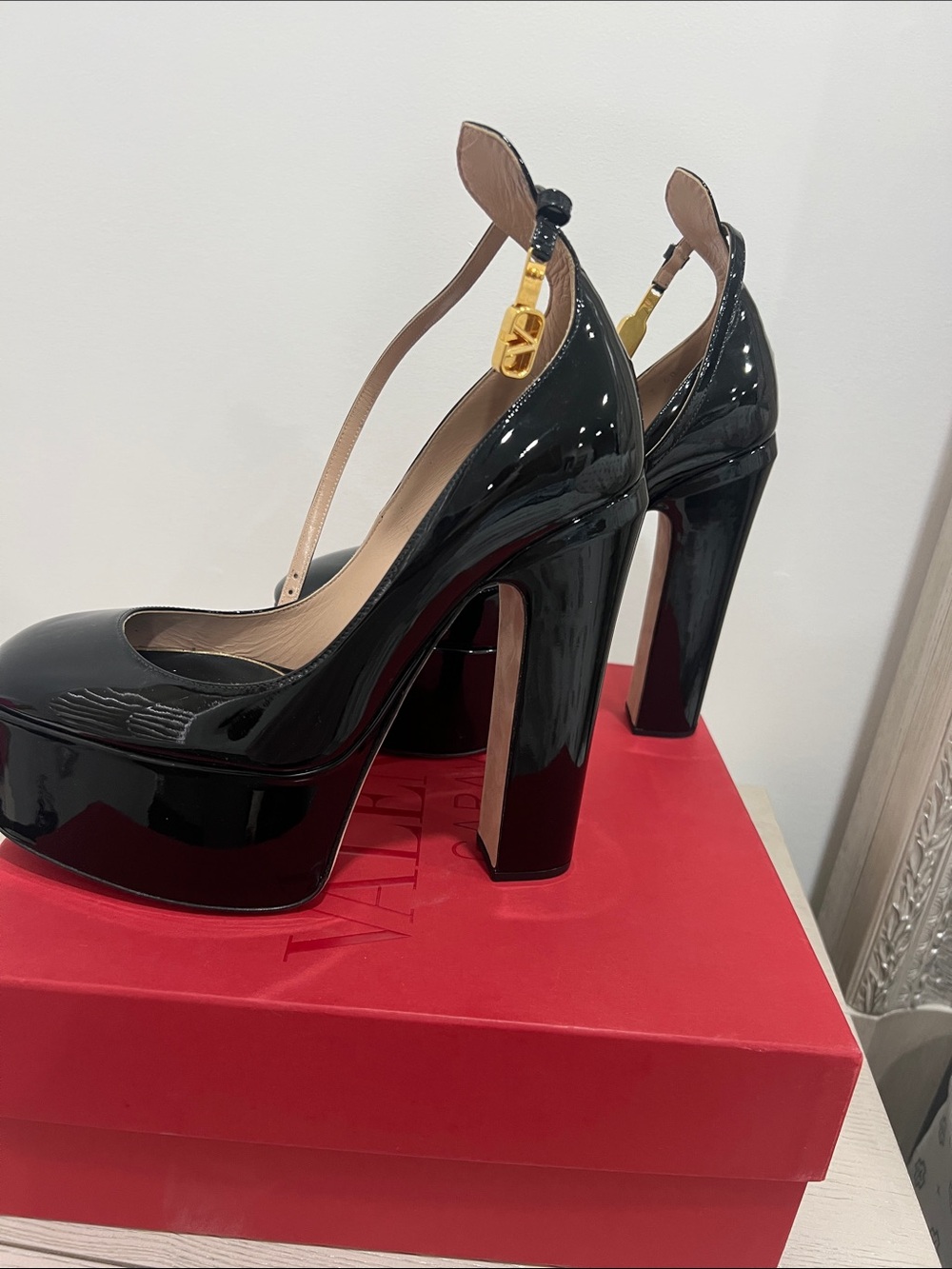 Valentino Garavani Black Patent Platform Pumps with Gold Charm